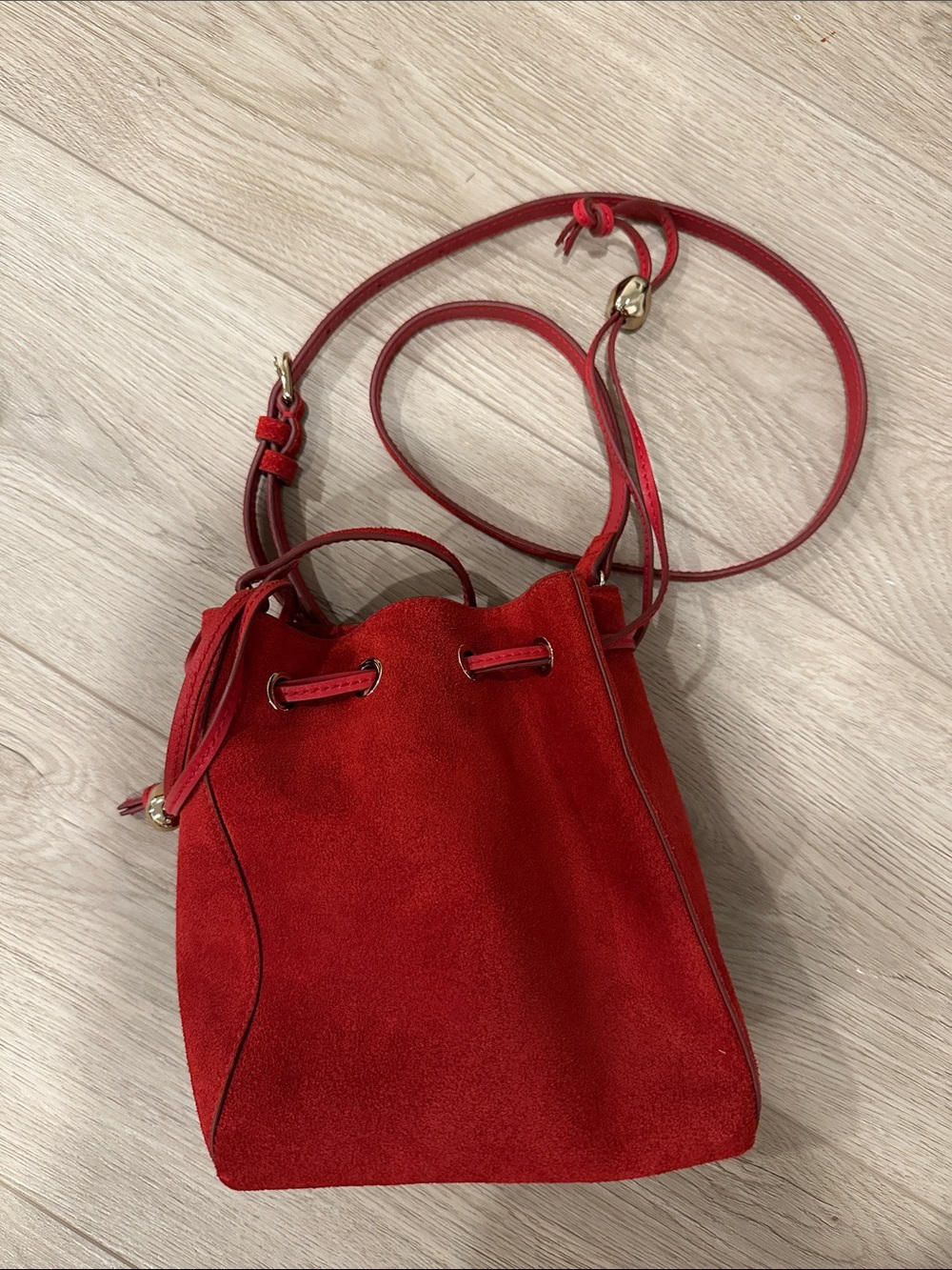 Madewell Mini Drawstring Crossbody Bucket Bag in Red Suede